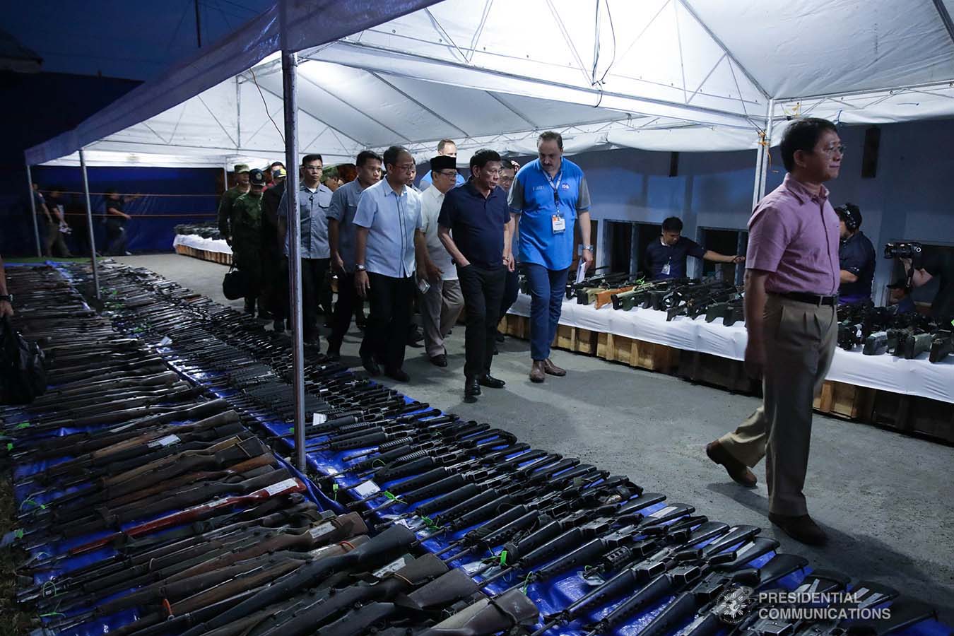President Rodrigo Roa Duterte inspects the decommissioned firearms from the former combatants of the Moro Islamic Liberation Front during their decommissioning at the Old Provincial Capitol Compound in Sultan Kudarat, Maguindanao on September 7, 2019. ROBINSON NIÑAL JR./PRESIDENTIAL PHOTO