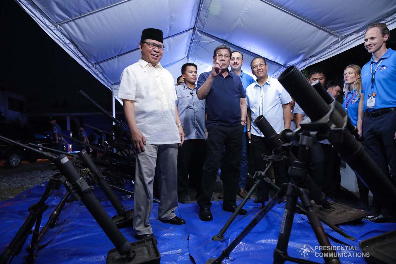 President Rodrigo Roa Duterte inspects the decommissioned firearms from the former combatants of the Moro Islamic Liberation Front during their decommissioning at the Old Provincial Capitol Compound in Sultan Kudarat, Maguindanao on September 7, 2019. ROBINSON NIÑAL JR./PRESIDENTIAL PHOTO
