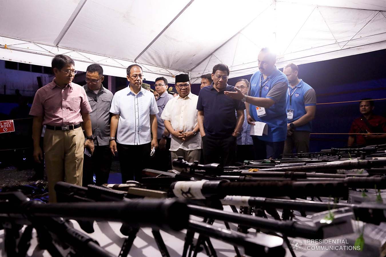 President Rodrigo Roa Duterte inspects the decommissioned firearms from the former combatants of the Moro Islamic Liberation Front during their decommissioning at the Old Provincial Capitol Compound in Sultan Kudarat, Maguindanao on September 7, 2019. KARL NORMAN ALONZO/PRESIDENTIAL PHOTO