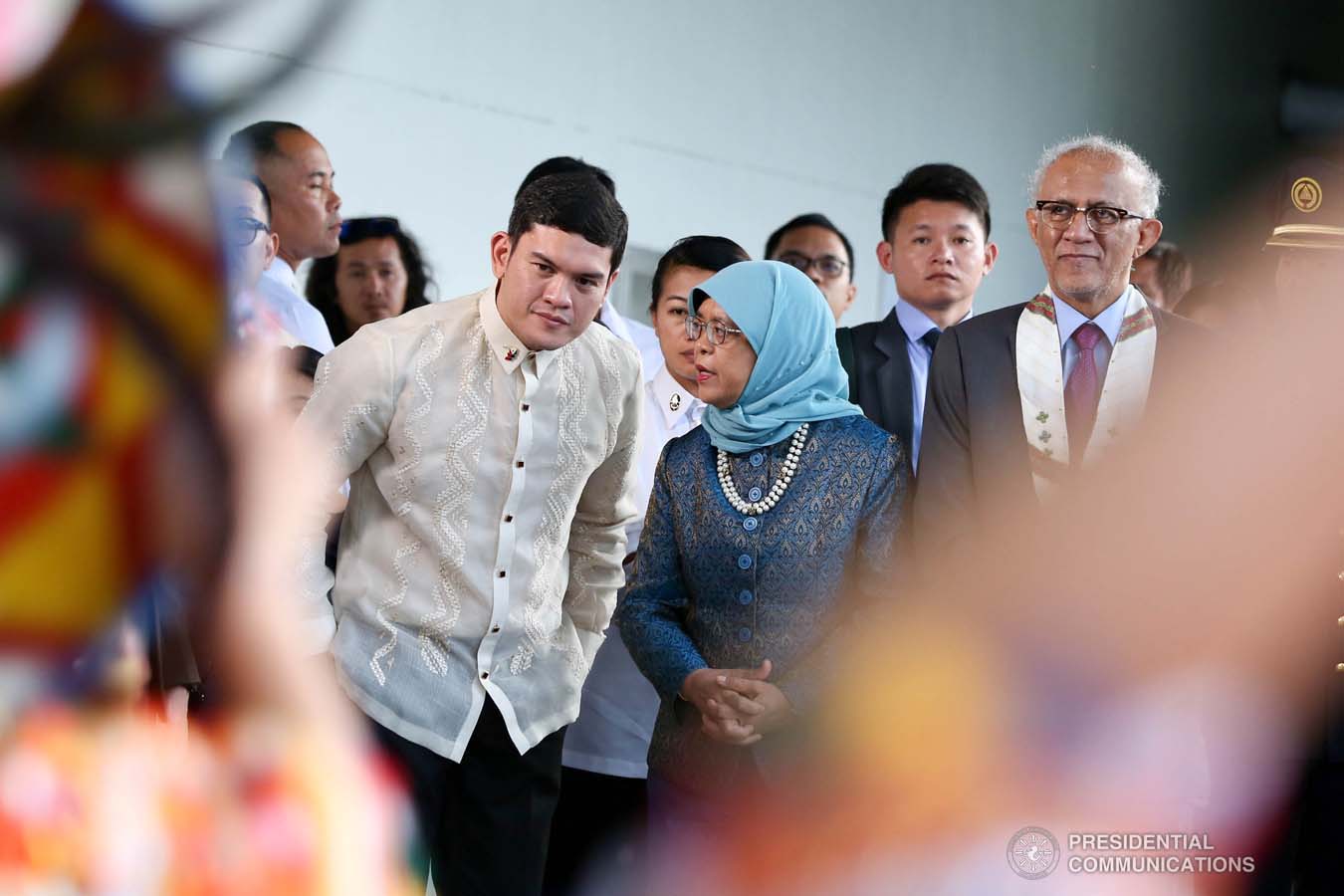 Republic of Singapore President Halimah Yacob is accompanied by Davao City Vice Mayor Sebastian Duterte as she is entertained by cultural performers upon her arrival at the Davao International Airport in Davao City on September 10, 2019. RICHARD MADELO/PRESIDENTIAL PHOTO