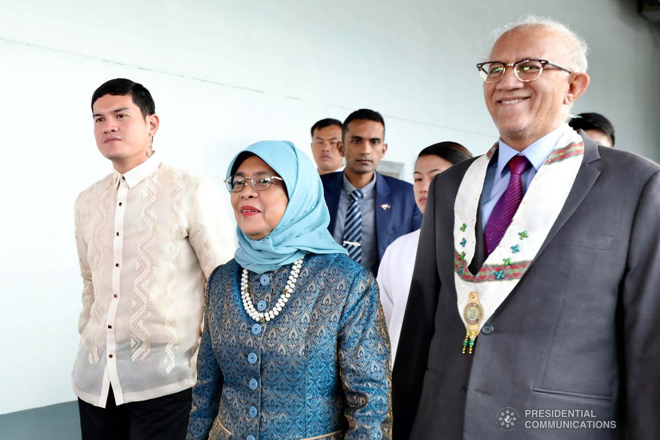 Republic of Singapore President Halimah Yacob is accompanied by Davao City Vice Mayor Sebastian Duterte as she is entertained by cultural performers upon her arrival at the Davao International Airport in Davao City on September 10, 2019. RICHARD MADELO/PRESIDENTIAL PHOTO