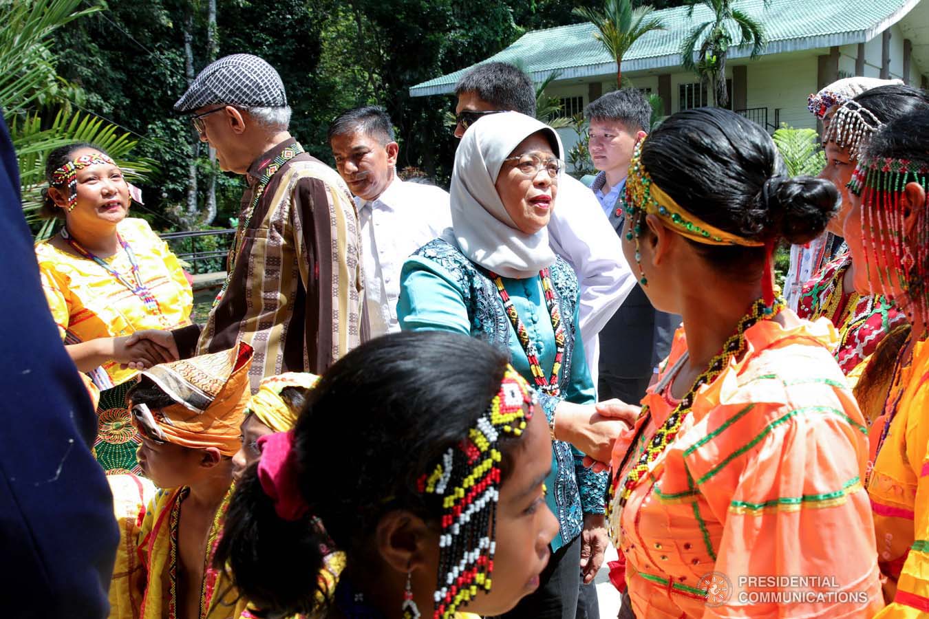 Republic of Singapore President Halimah Yacob greets the cultural performers who entertained her during her visit to the Philippine Eagle Center in Davao City on September 11, 2019. ROBINSON NIÑAL JR./PRESIDENTIAL PHOTO