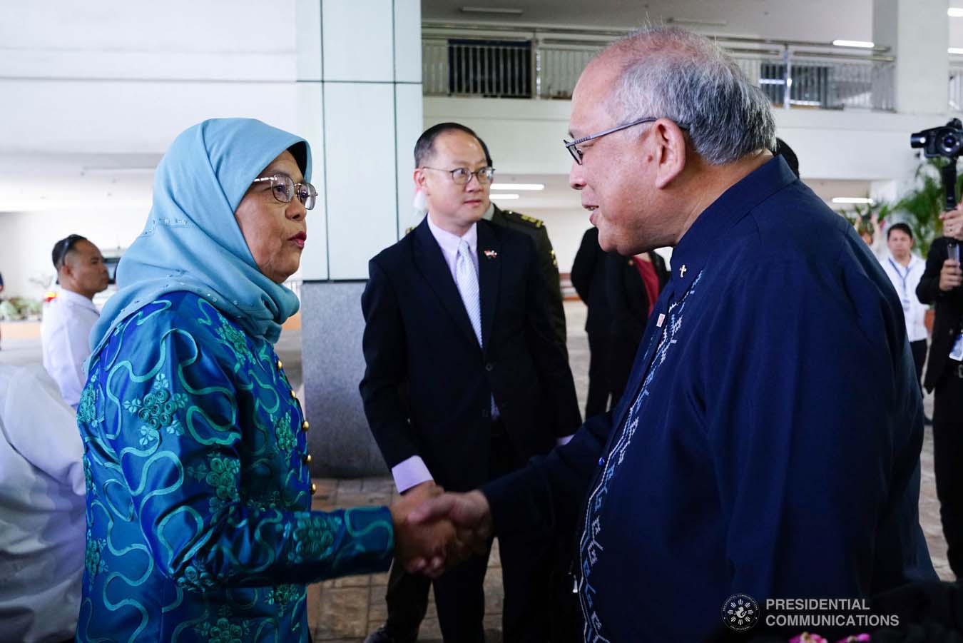 Republic of Singapore President Halimah Yacob receives a warm welcome from Ateneo de Davao University (ADDU) President Joel Tabora upon her arrival at the ADDU in Davao City on September 11, 2019. JOEY DALUMPINES/PRESIDENTIAL PHOTO