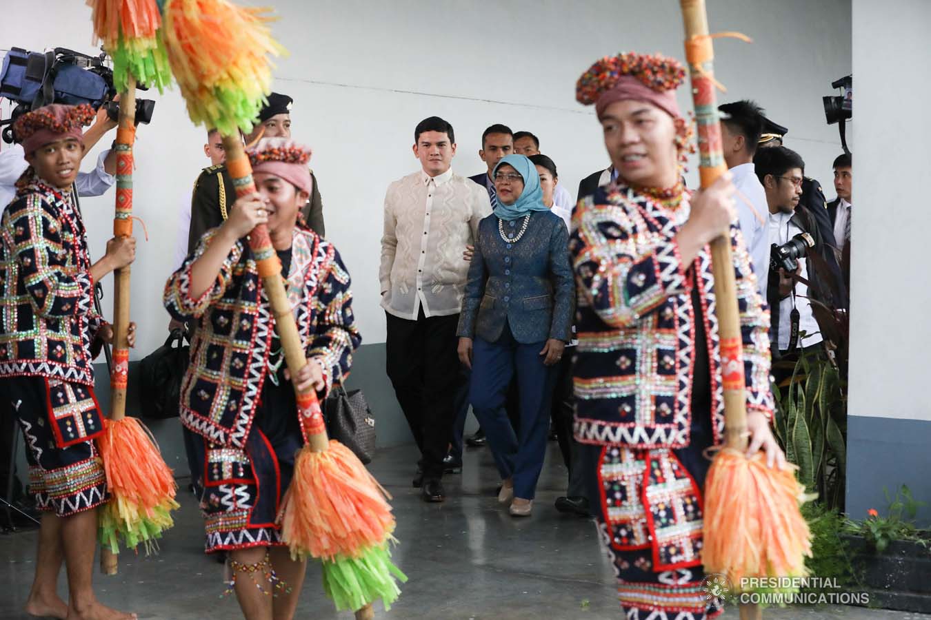 Republic of Singapore President Halimah Yacob is accompanied by Davao City Vice Mayor Sebastian Duterte as she is entertained by cultural performers upon her arrival at the Davao International Airport in Davao City on September 10, 2019. KARL NORMAN ALONZO/PRESIDENTIAL PHOTO