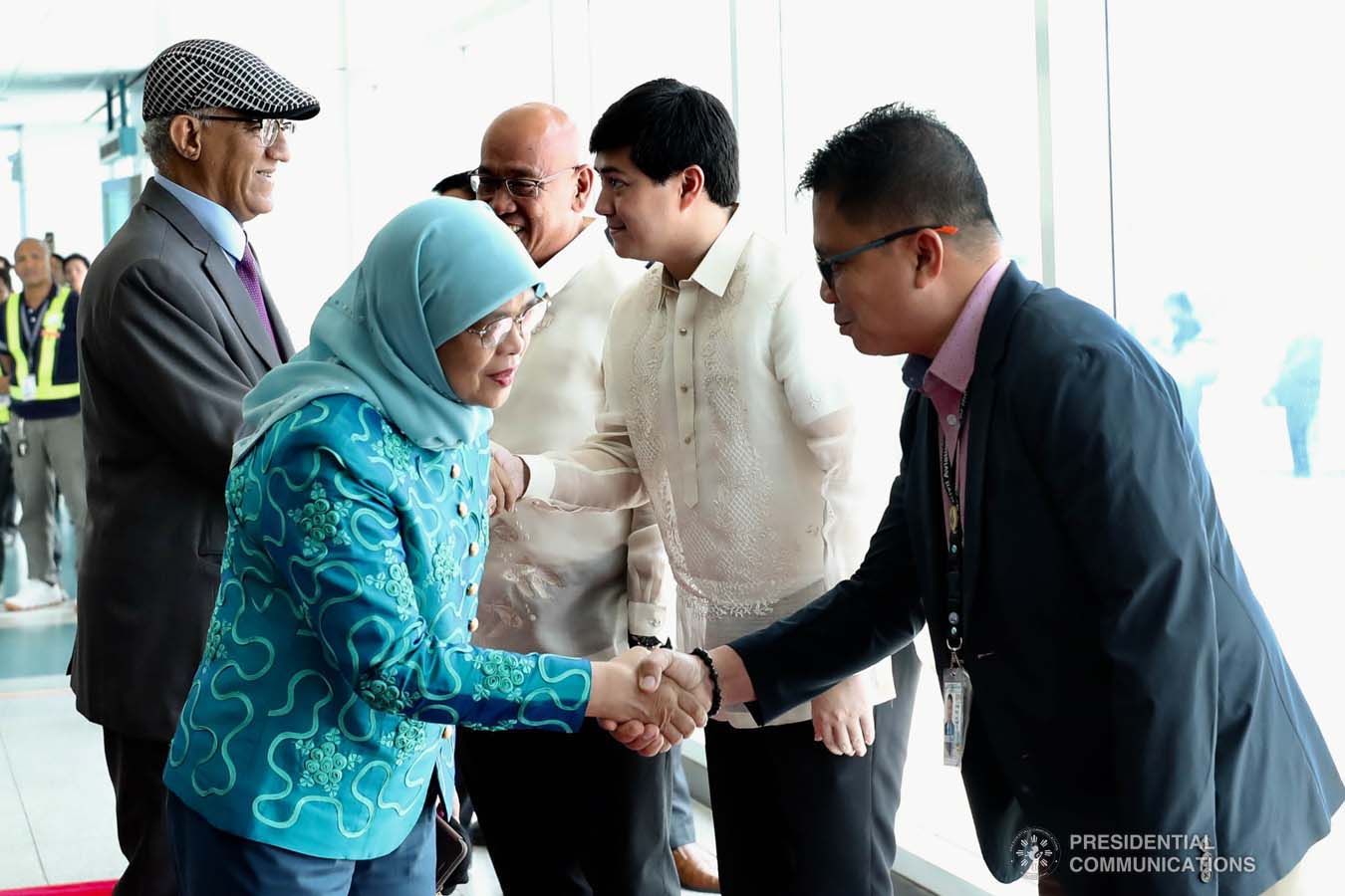 Republic of Singapore President Halimah Yacob bids farewell to the members of the send-off party prior to her departure at the Davao International Airport following her succesful visit in Davao City on September 11, 2019. RICHARD MADELO/PRESIDENTIAL PHOTO