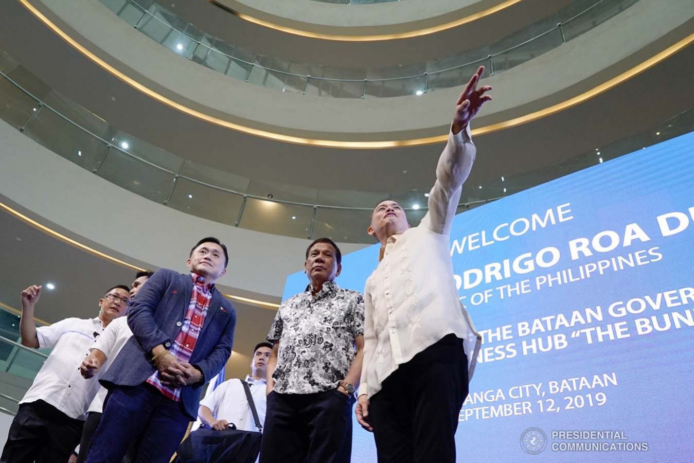 President Rodrigo Roa Duterte chats with Bataan Governor Albert Garcia during the inauguration of the Bataan Government Center and Business Hub “The Bunker” in Balanga City, Bataan on September 12, 2019. With the President is Senator Christopher "Bong" Go. KING RODRIGUEZ/PRESIDENTIAL PHOTO