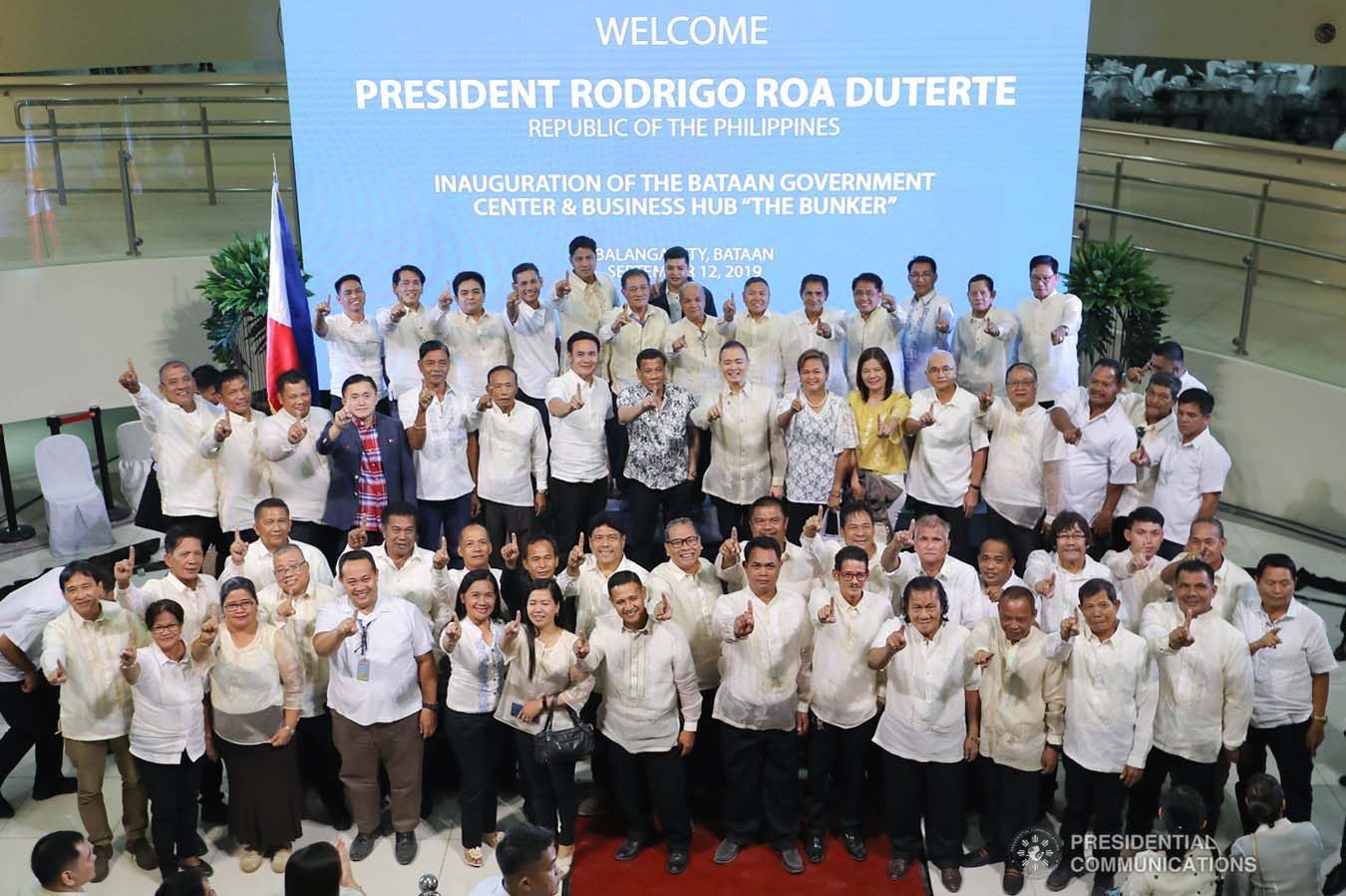 President Rodrigo Roa Duterte poses for posterity with the guests during the inauguration of the Bataan Government Center and Business Hub “The Bunker” in Balanga City, Bataan on September 12, 2019. VALERIE ESCALERA/PRESIDENTIAL PHOTO