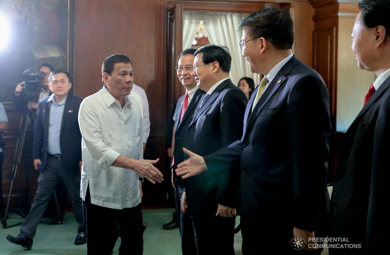 President Rodrigo Roa Duterte greets the officials of the Communist Party of China (CPC) Chongqing Party who paid a courtesy call on the President at the Malacañan Palace on September 16, 2019. VALERIE ESCALERA/PRESIDENTIAL PHOTO