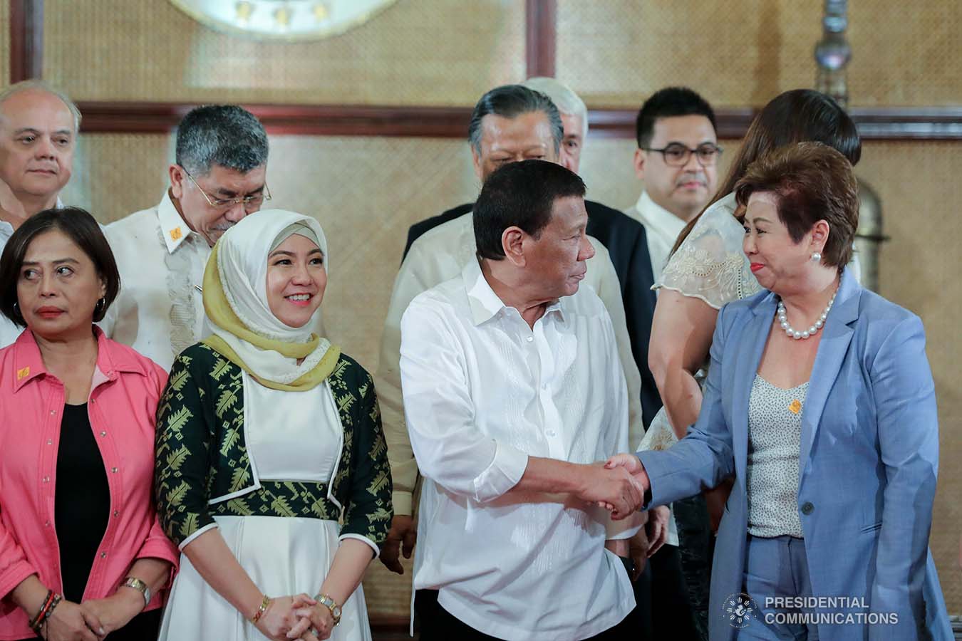 President Rodrigo Roa Duterte greets one of the newly appointed officials following their oath-taking ceremony at the Malacañan Palace on September 17, 2019. ALFRED FRIAS/PRESIDENTIAL PHOTO