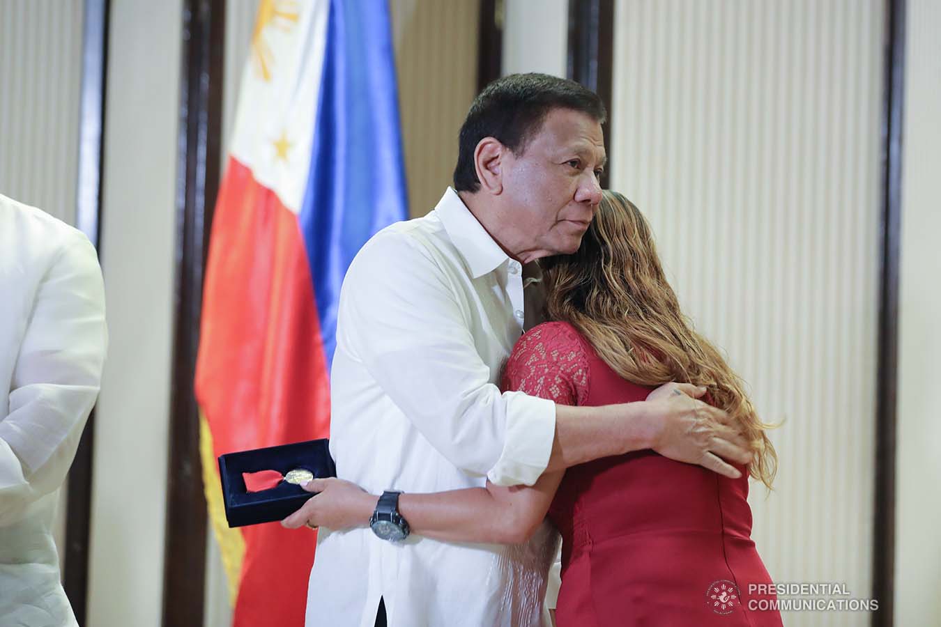 President Rodrigo Roa Duterte condoles with the kin of one of the killed soldiers as he posthumously awards the Order of Lapu-Lapu Rank of Kalasag during a ceremony at the Malacañan Palace on September 17, 2019. ALFRED FRIAS/PRESIDENTIAL PHOTO