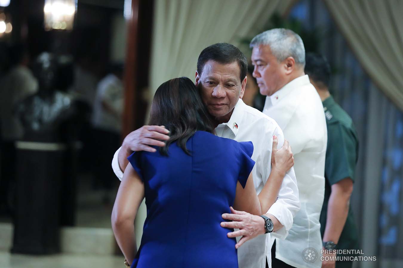 President Rodrigo Roa Duterte condoles with the kin of one of the killed soldiers as he posthumously awards the Order of Lapu-Lapu Rank of Kalasag during a ceremony at the Malacañan Palace on September 17, 2019. ALFRED FRIAS/PRESIDENTIAL PHOTO