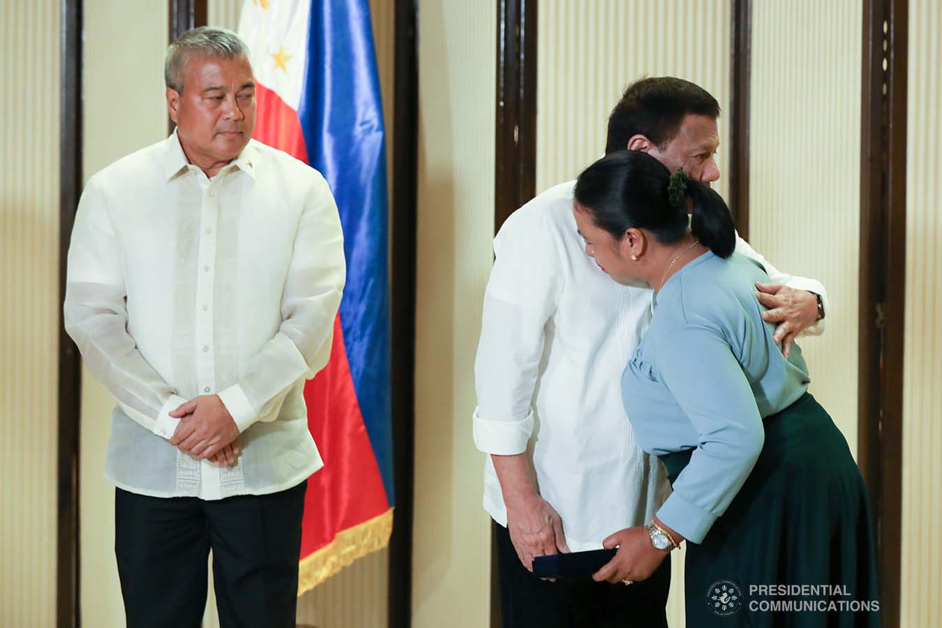 President Rodrigo Roa Duterte condoles with the kin of one of the killed soldiers as he posthumously awards the Order of Lapu-Lapu Rank of Kalasag during a ceremony at the Malacañan Palace on September 17, 2019. TOTO LOZANO/PRESIDENTIAL PHOTO
