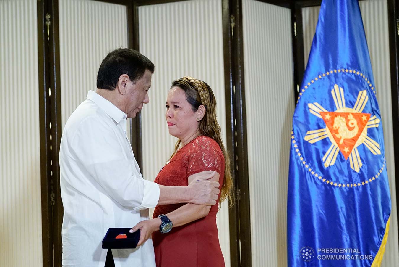 President Rodrigo Roa Duterte condoles with the kin of one of the killed soldiers as he posthumously awards the Order of Lapu-Lapu Rank of Kalasag during a ceremony at the Malacañan Palace on September 17, 2019. KING RODRIGUEZ/PRESIDENTIAL PHOTO