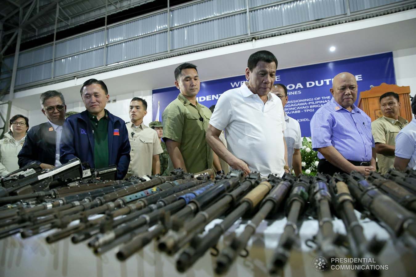 President Rodrigo Roa Duterte inspects the firearms from the 727 Rebolusyonaryong Partido ng Manggagawa - Pilipinas/ Revolutionary Proletarian Army/ Alex Boncayao Brigade - Tabara-Paduano Group (RPM-P/RPA/ABB-TPG) during the decommissioning at the Camp General Macario B. Peralta, Jr. in Jamindan, Capiz on September 19, 2019. ALBERT ALCAIN/PRESIDENTIAL PHOTO