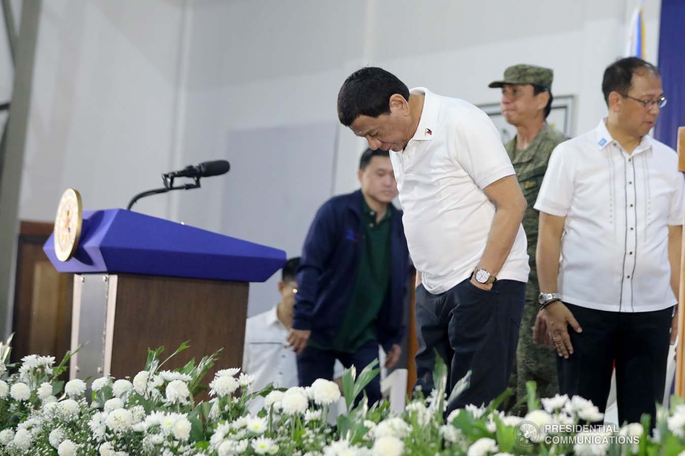 President Rodrigo Roa Duterte takes a bow as he takes center stage during the decommissioning of the arms and forces of the 727 Rebolusyonaryong Partido ng Manggagawa - Pilipinas/ Revolutionary Proletarian Army/ Alex Boncayao Brigade - Tabara-Paduano Group (RPM-P/RPA/ABB-TPG) at the Camp General Macario B. Peralta, Jr. in Jamindan, Capiz on September 19, 2019. ALFRED FRIAS/PRESIDENTIAL PHOTO