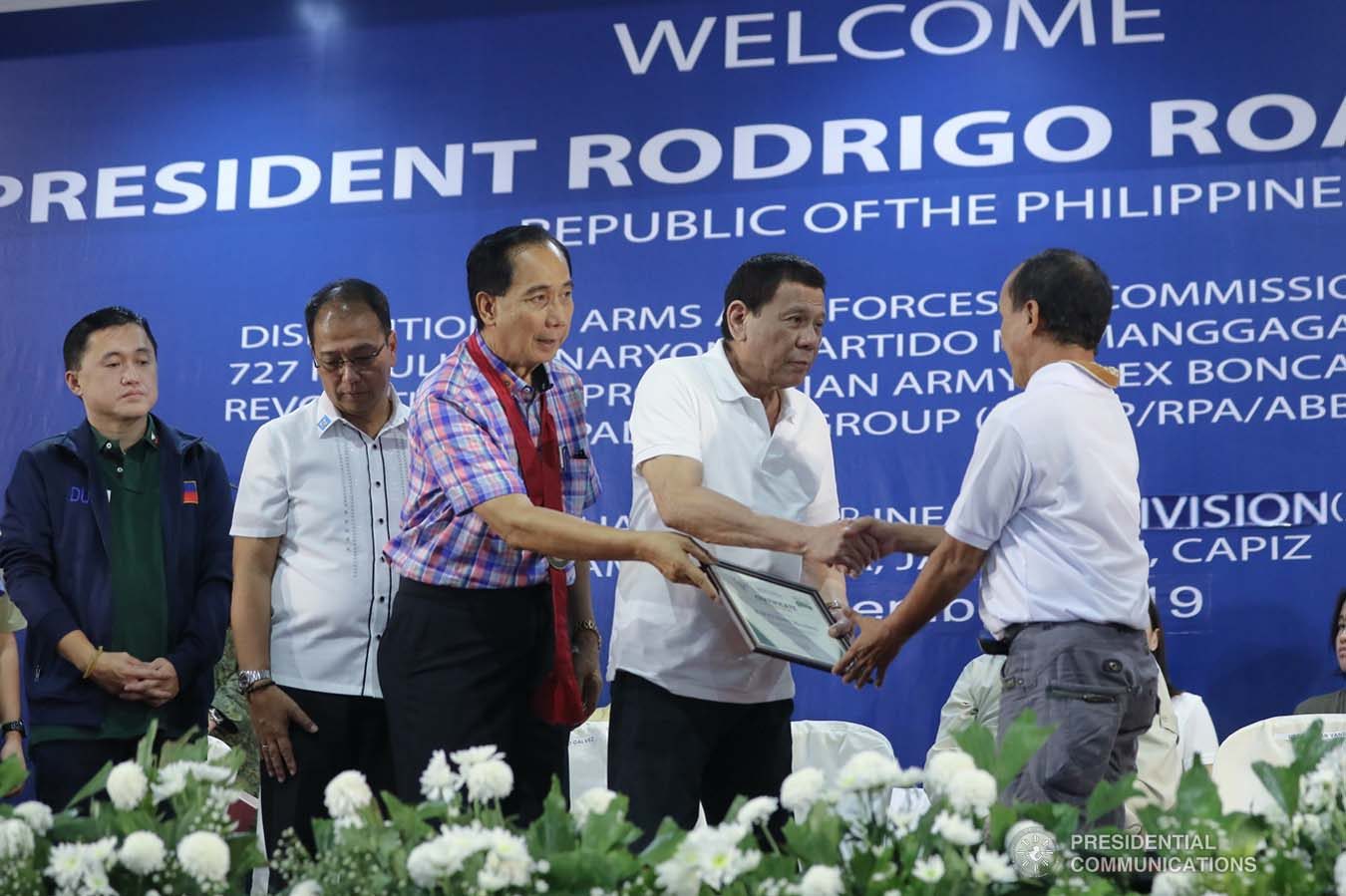 President Rodrigo Roa Duterte leads the awarding of the continuous support and agency commitments during the decommissioning of the arms and forces of the 727 Rebolusyonaryong Partido ng Manggagawa - Pilipinas/ Revolutionary Proletarian Army/ Alex Boncayao Brigade - Tabara-Paduano Group (RPM-P/RPA/ABB-TPG) at the Camp General Macario B. Peralta, Jr. in Jamindan, Capiz on September 19, 2019. ALFRED FRIAS/PRESIDENTIAL PHOTO