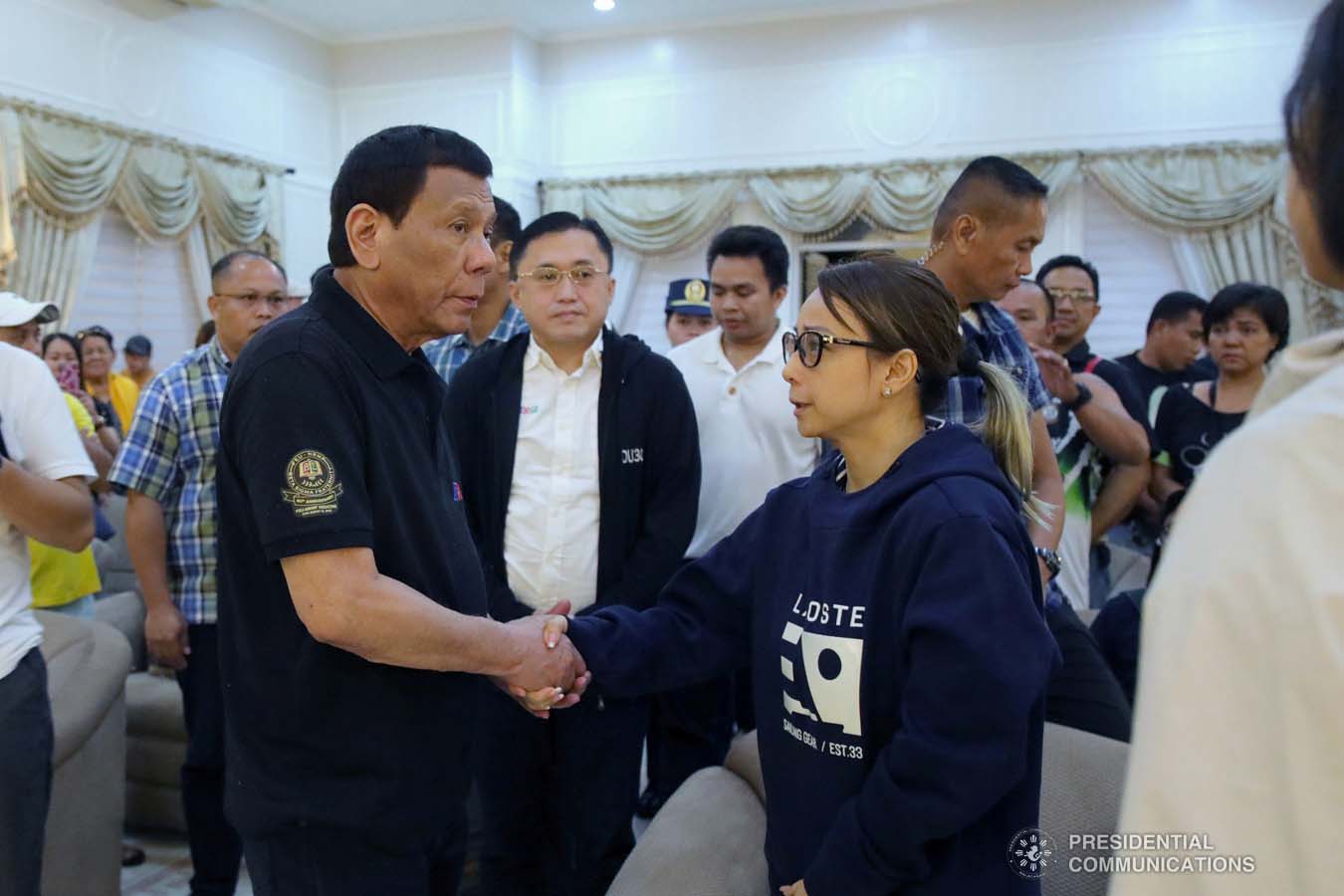 President Rodrigo Roa Duterte condoles with the family of Noli Ignacio as he visits the wake at the Cosmopolitan Funeral Homes in Davao City on September 21, 2019. ROBINSON NIÑAL JR./PRESIDENTIAL PHOTO