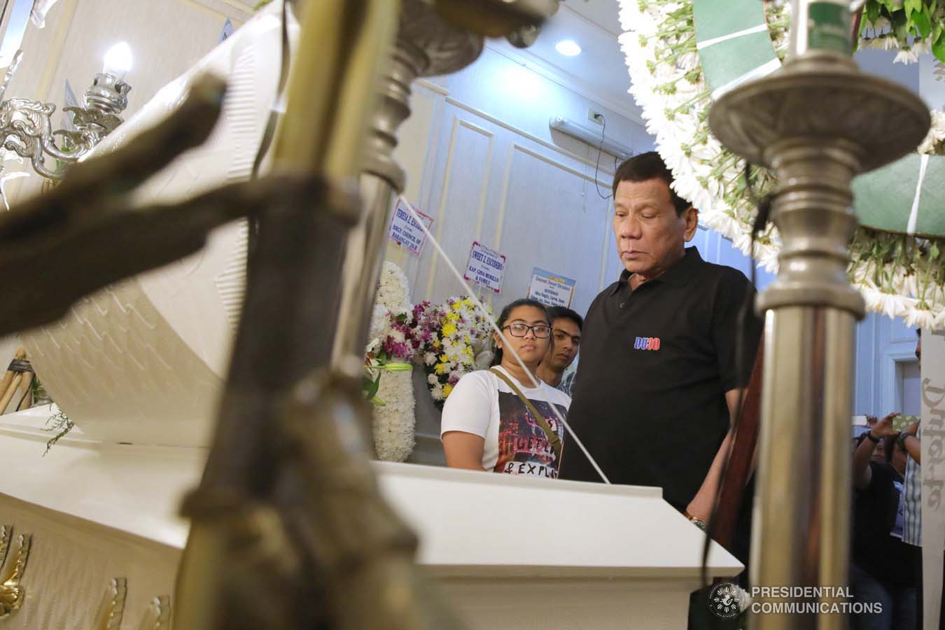 President Rodrigo Roa Duterte pays his last respects to Teresa Escudero as he visits the wake at the Cosmopolitan Funeral Homes in Davao City on September 21, 2019. ROBINSON NIÑAL JR./PRESIDENTIAL PHOTO