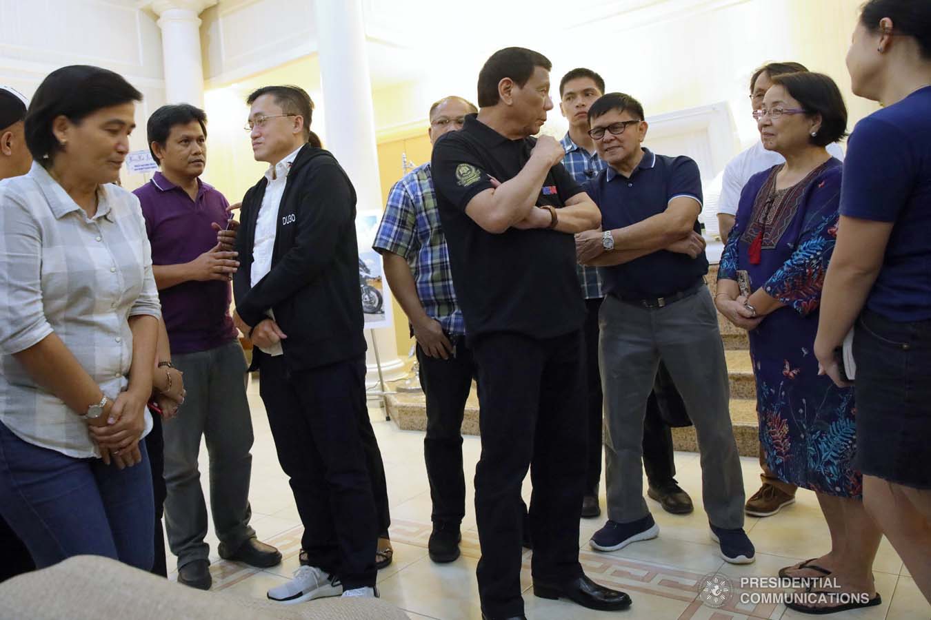 President Rodrigo Roa Duterte condoles with the family of Noli Ignacio as he visits the wake at the Cosmopolitan Funeral Homes in Davao City on September 21, 2019. ROBINSON NIÑAL JR./PRESIDENTIAL PHOTO