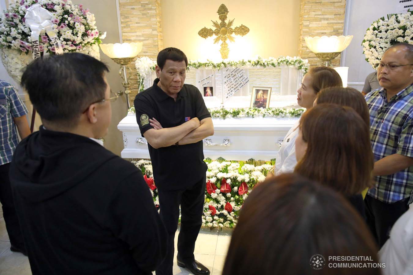 President Rodrigo Roa Duterte condoles with the family of Lolita Rivera as he visits the wake at the Cosmopolitan Funeral Homes in Davao City on September 21, 2019. ROBINSON NIÑAL JR./PRESIDENTIAL PHOTO