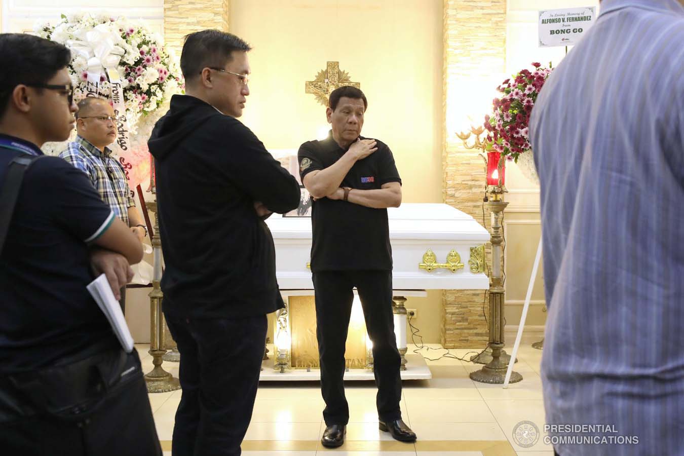 President Rodrigo Roa Duterte condoles with the family of Alfonso Fernandez as he visits the wake at the Cosmopolitan Funeral Homes in Davao City on September 21, 2019. KARL NORMAN ALONZO/PRESIDENTIAL PHOTO