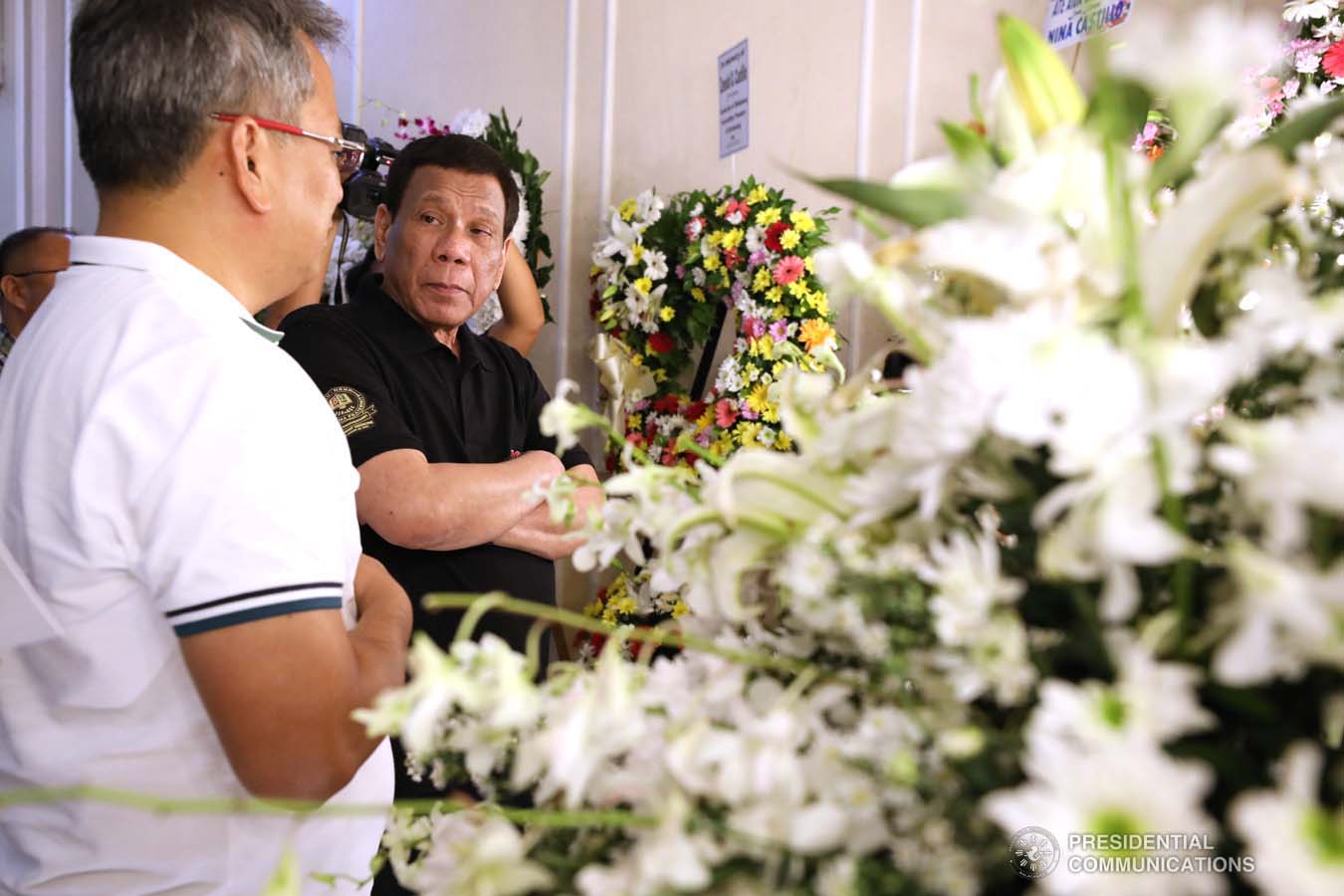 President Rodrigo Roa Duterte pays his last respects to Zenaida Castillo as he visits the wake at the Cosmopolitan Funeral Homes in Davao City on September 21, 2019. KARL NORMAN ALONZO/PRESIDENTIAL PHOTO