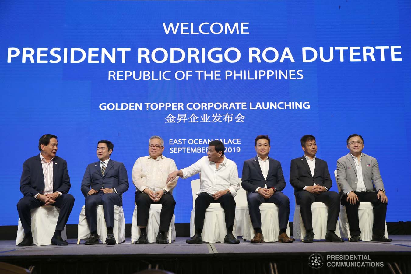 President Rodrigo Roa Duterte is joined on stage by Trade and Industry Secretary Ramon Lopez, the officials of the Golden Topper Group Inc., and other distinguished guests during the Golden Topper Corporate Launch at the Aseana Business Park in Parañaque City on September 25, 2019. ALBERT ALCAIN/PRESIDENTIAL PHOTO