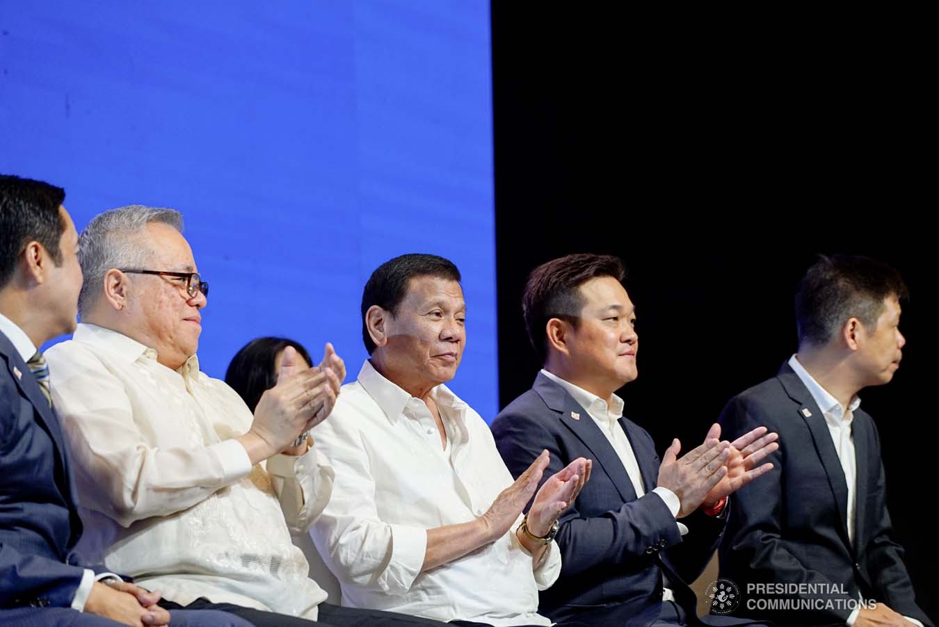 President Rodrigo Roa Duterte applauds while witnessing the program proper during the Golden Topper Corporate Launch at the Aseana Business Park in Parañaque City on September 25, 2019. KING RODRIGUEZ/PRESIDENTIAL PHOTO