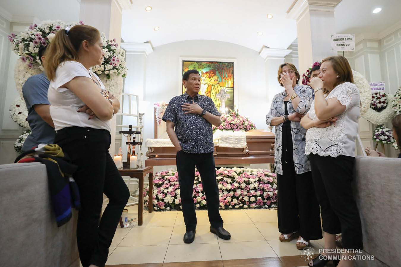 President Rodrigo Roa Duterte condoles with the family of Cresencia Josol as he visits the wake at the Cosmopolitan Funeral Homes in Davao City on September 26, 2019. KARL NORMAN ALONZO/PRESIDENTIAL PHOTO