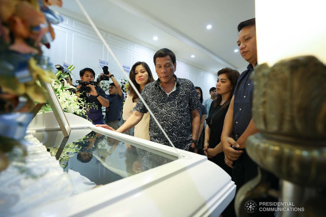 President Rodrigo Roa Duterte and his partner Cielito Avanceña pay their last respects to Ethan Dabi as they visit the wake at the Cosmopolitan Funeral Homes in Davao City on September 26, 2019. KARL NORMAN ALONZO/PRESIDENTIAL PHOTO