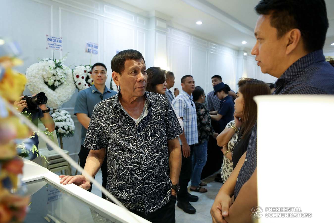 President Rodrigo Roa Duterte condoles with the family of Ethan Dabi as he visits the wake at the Cosmopolitan Funeral Homes in Davao City on September 26, 2019. KARL NORMAN ALONZO/PRESIDENTIAL PHOTO
