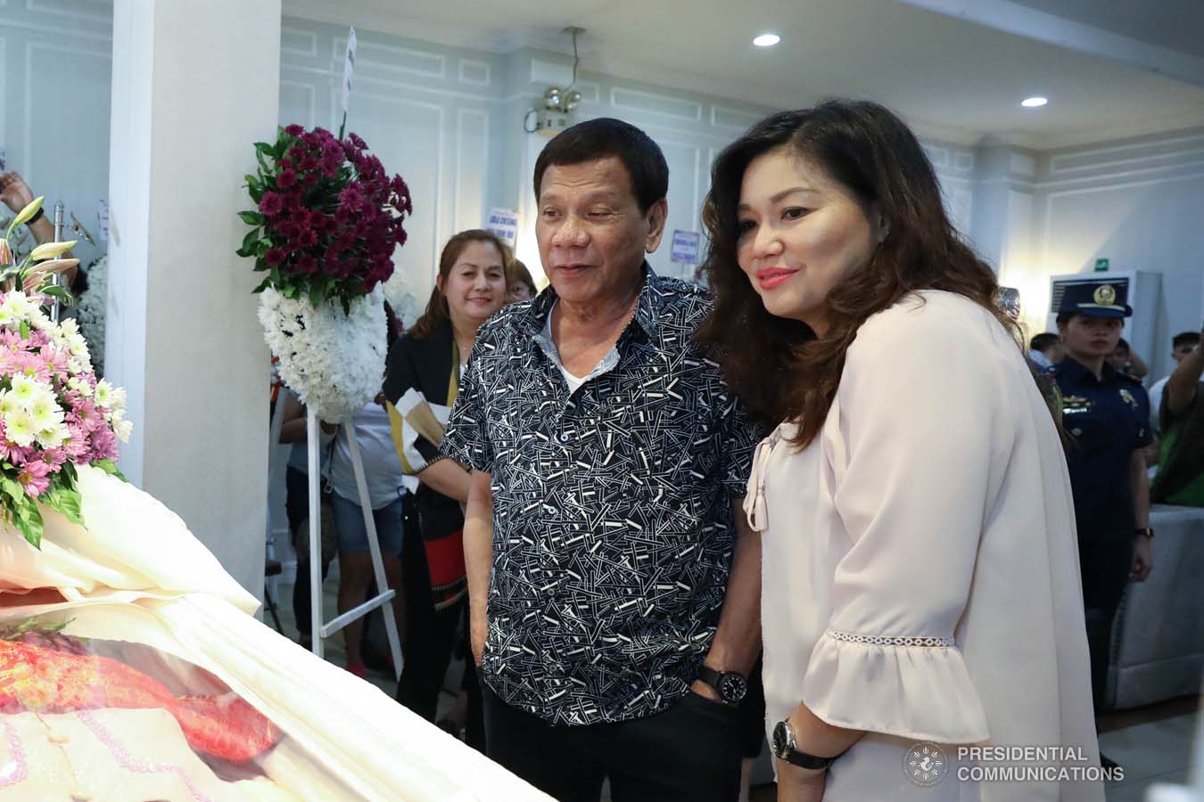 President Rodrigo Roa Duterte and his partner Cielito Avanceña pay their last respects to Cresencia Josol as they visit the wake at the Cosmopolitan Funeral Homes in Davao City on September 26, 2019. RICHARD MADELO/PRESIDENTIAL PHOTO
