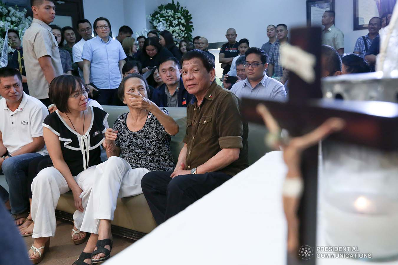 President Rodrigo Roa Duterte commiserates with the family of the late Engr. Salvador M. Lecaros as he visits the wake at St. Peter Memorial Chapel in Cebu City on September 6, 2019. ALBERT ALCAIN/ PRESIDENTIAL PHOTO