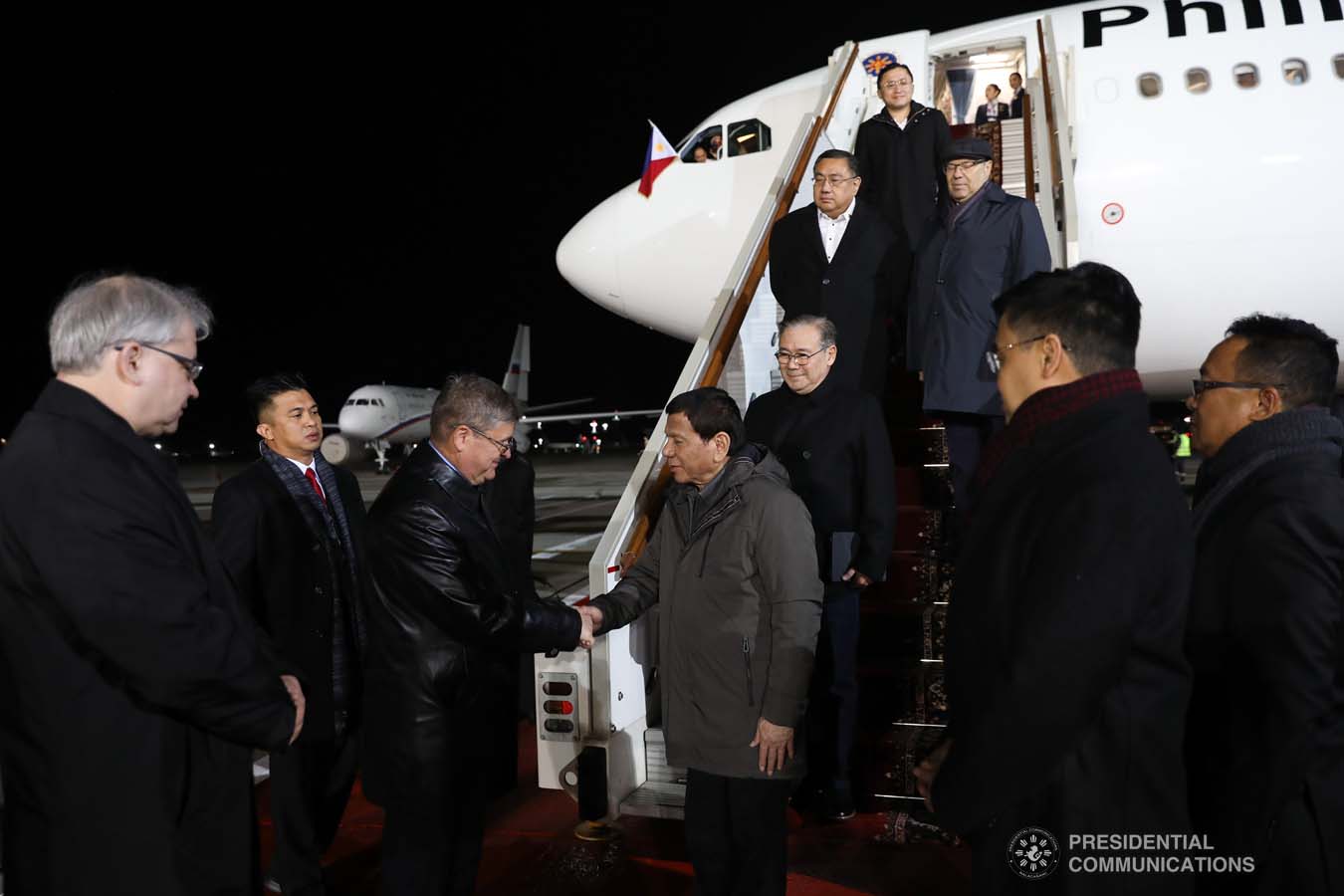 President Rodrigo Roa Duterte receives a warm welcome from the members of the reception party upon his arrival at the Vnukovo Military Base Airport in Moscow, Russian Federation on October 2, 2019. ALFRED FRIAS/PRESIDENTIAL PHOTO
