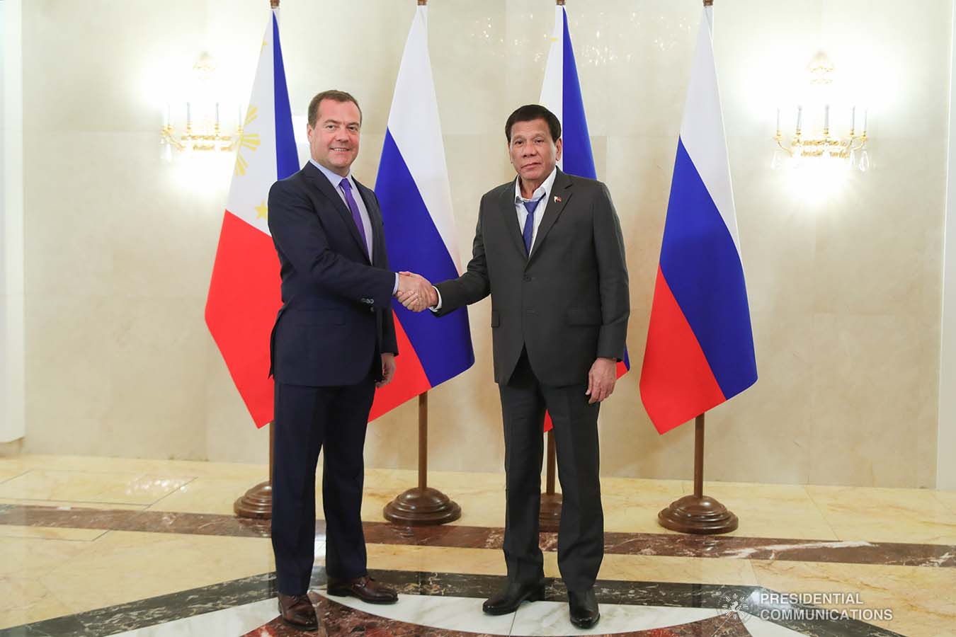 President Rodrigo Roa Duterte and Russian Prime Minister Dmitry Medvedev pose for posterity prior to the start of their bilateral meeting at the Prime Minister's Office in Moscow on October 2, 2019. ROBINSON NIÑAL JR./PRESIDENTIAL PHOTO