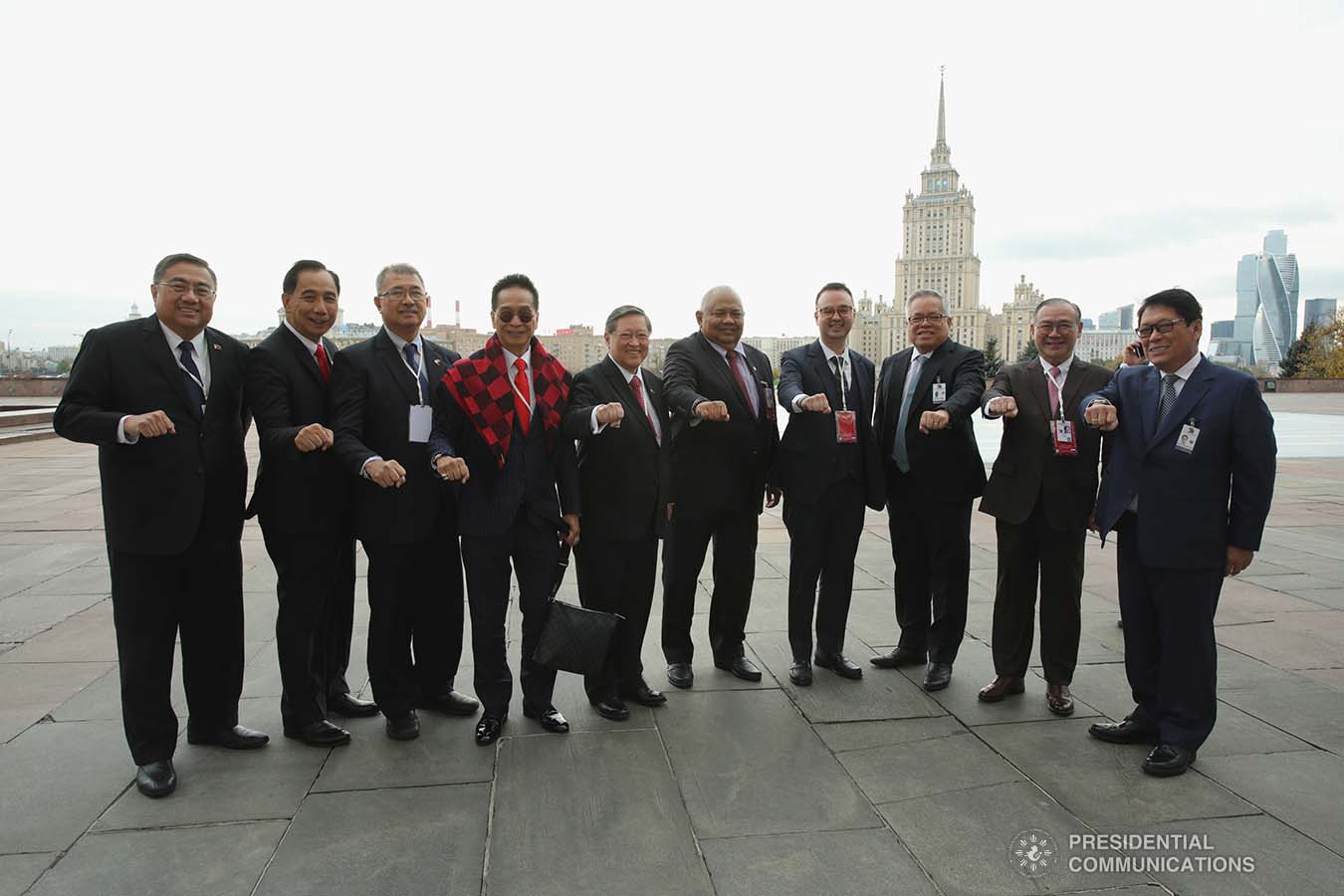 The members of President Rodrigo Roa Duterte's delegation flash the President's signature pose prior to their bilateral meeting with Russian Prime Minister Dmitry Medvedev at the Prime Minister's Office in Moscow on October 2, 2019. ROBINSON NIÑAL JR./PRESIDENTIAL PHOTO