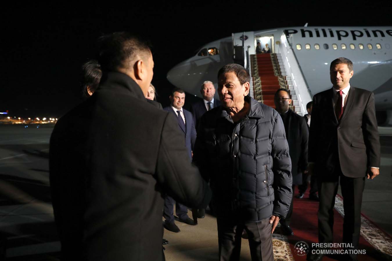 President Rodrigo Roa Duterte receives a warm welcome from the members of the reception party upon his arrival at the Sochi International Airport in Russia on October 2, 2019. KARL NORMAN ALONZO/PRESIDENTIAL PHOTO