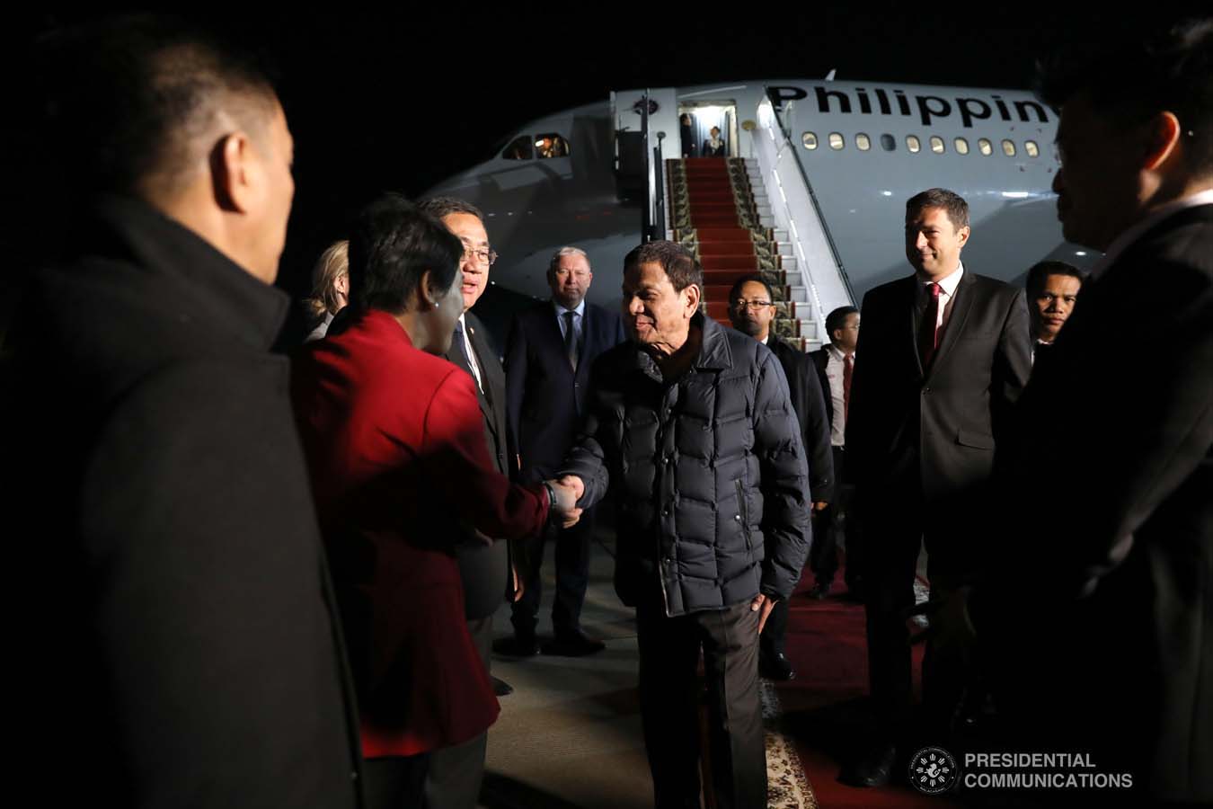 President Rodrigo Roa Duterte receives a warm welcome from the members of the reception party upon his arrival at the Sochi International Airport in Russia on October 2, 2019. KARL NORMAN ALONZO/PRESIDENTIAL PHOTO