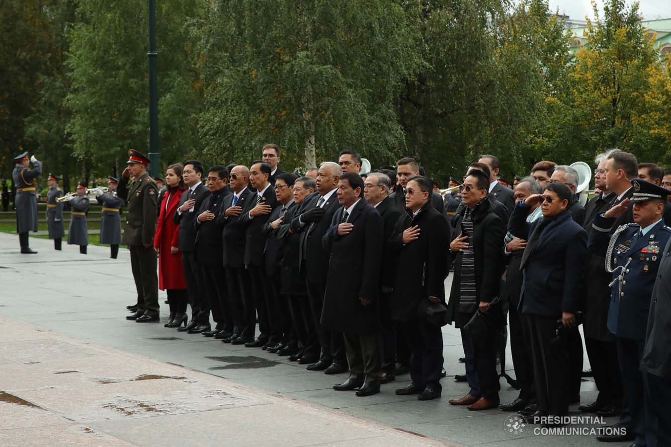 President Rodrigo Roa Duterte and members of his delegation sing the Philippine National Anthem during the wreath-laying ceremony at the Tomb of the Unknown Soldier in Moscow, Russian Federation on October 4, 2019. ROBINSON NIÑAL JR./PRESIDENTIAL PHOTO