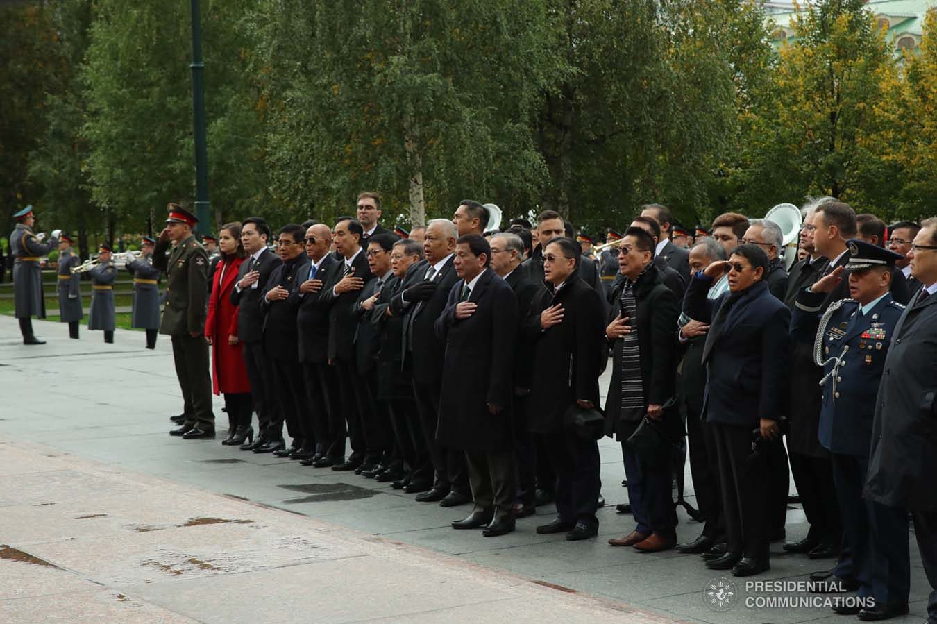 President Rodrigo Roa Duterte and members of his delegation sing the Philippine National Anthem during the wreath-laying ceremony at the Tomb of the Unknown Soldier in Moscow, Russian Federation on October 4, 2019. ROBINSON NIÑAL JR./PRESIDENTIAL PHOTO