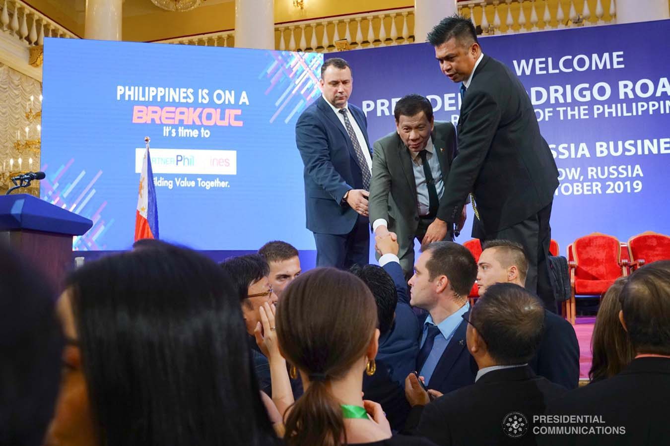 President Rodrigo Roa Duterte greets one of the guests during the Philippines-Russia Business Forum at the House of the Unions in Moscow, Russian Federation on October 4, 2019. JOEY DALUMPINES/PRESIDENTIAL PHOTO