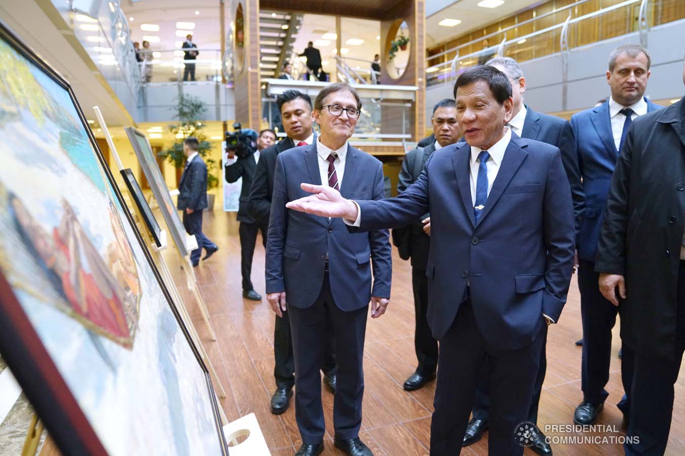 President Rodrigo Roa Duterte admires the artwork displayed during the ASEAN-Russian Exhibition at the Moscow State Institute of International Relations (MGIMO) University in Moscow, Russian Federation on October 05, 2019. JOEY DALUMPINES/PRESIDENTIAL PHOTO
