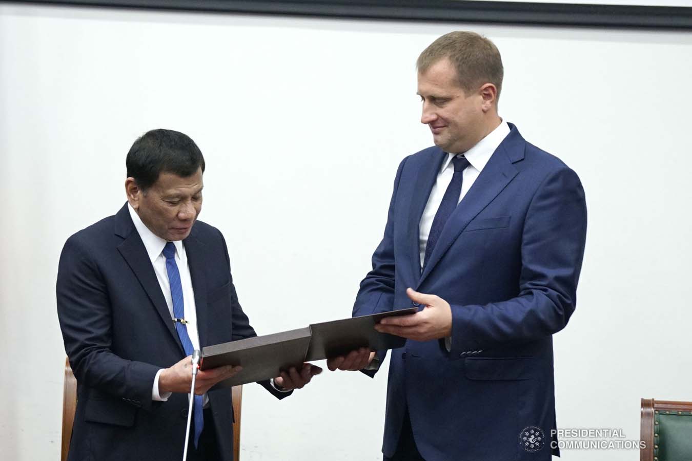 President Rodrigo Roa Duterte receives an honorary doctorate degree diploma from Moscow State Institute of International Relations (MGIMO) University Vice Rector Artem Malgin during a ceremony at the MGIMO University in Moscow, Russian Federation on October 05, 2019. JOEY DALUMPINES/PRESIDENTIAL PHOTO
