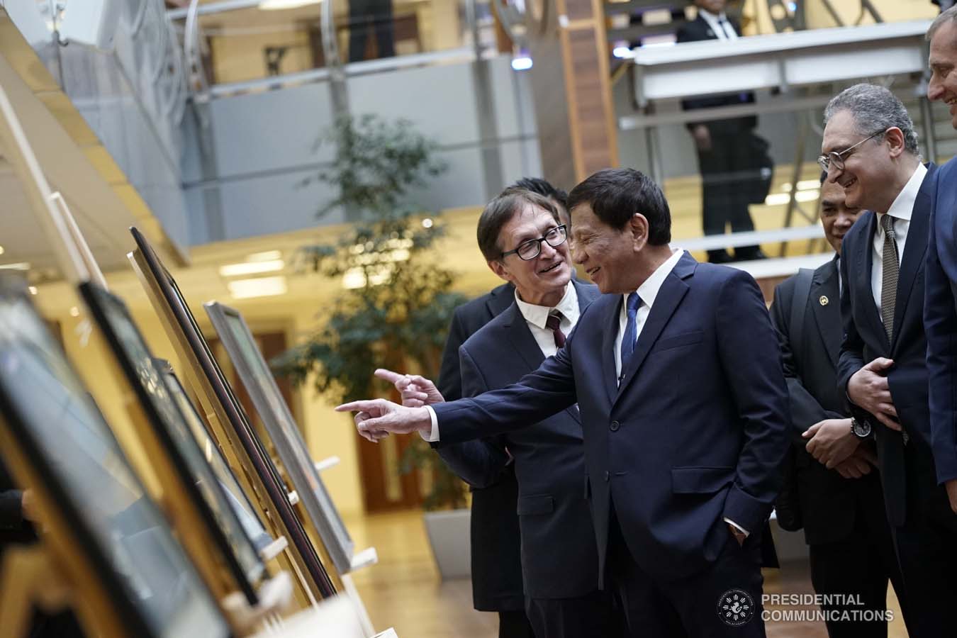 President Rodrigo Roa Duterte admires the artwork displayed during the ASEAN-Russian Exhibition at the Moscow State Institute of International Relations (MGIMO) University in Moscow, Russian Federation on October 05, 2019. KING RODRIGUEZ/PRESIDENTIAL PHOTO