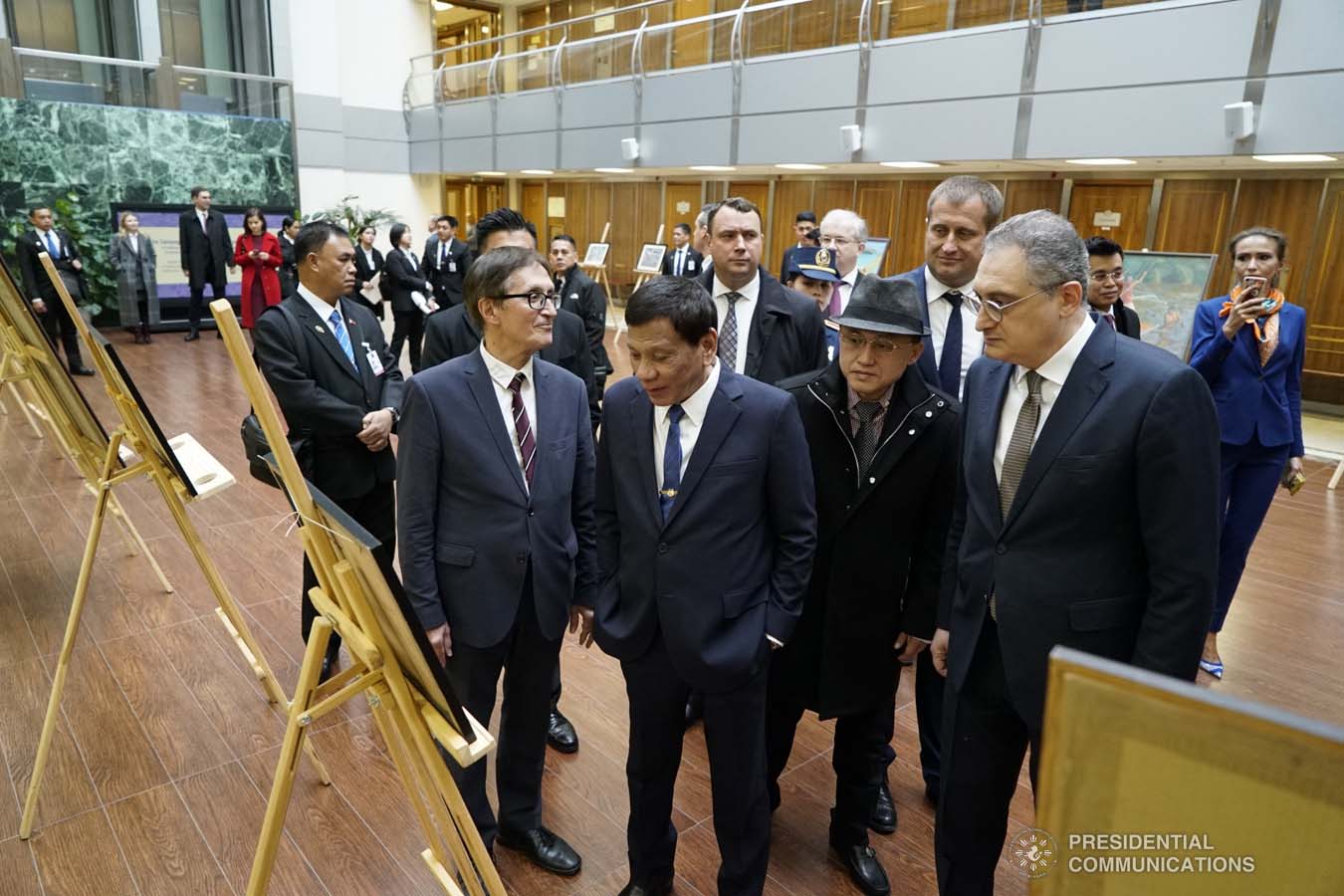 President Rodrigo Roa Duterte admires the artwork displayed during the ASEAN-Russian Exhibition at the Moscow State Institute of International Relations (MGIMO) University in Moscow, Russian Federation on October 05, 2019. KING RODRIGUEZ/PRESIDENTIAL PHOTO
