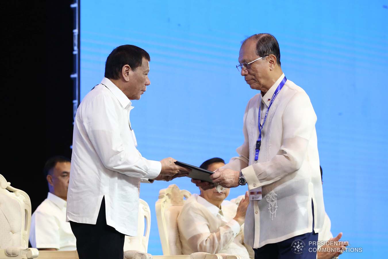 President Rodrigo Roa Duterte receives the 45th Philippine Business Conference Resolutions presented by 45th Philippine Business Conference and Expo Chairman William Co during the awarding ceremony at The Manila Hotel on October 17, 2019. RICHARD MADELO/PRESIDENTIAL PHOTO