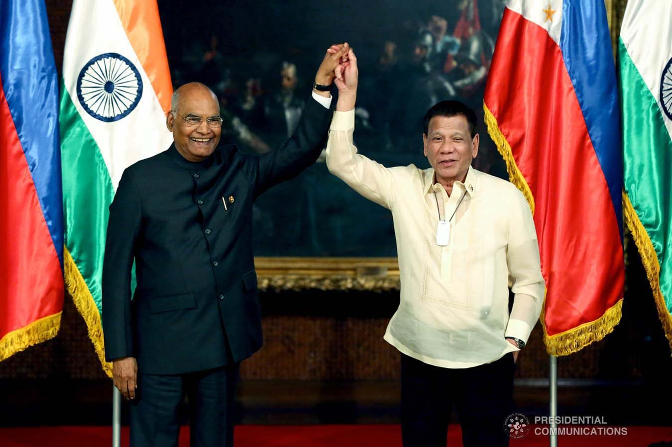 President Rodrigo Roa Duterte gets his hand raised by President of the Republic of India Ram Nath Kovind after declaring their joint press statements following the successful expanded bilateral meeting at the Malacañan Palace on October 18, 2019. President Kovind is on a five-day state visit to the Philippines. RICHARD MADELO/PRESIDENTIAL PHOTO