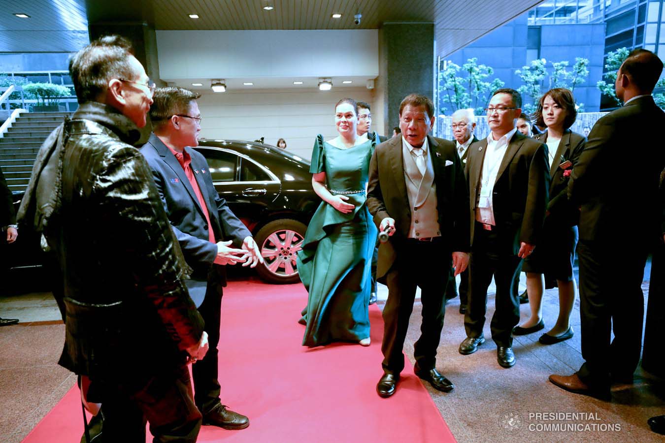 President Rodrigo Roa Duterte and his daughter, Davao City Mayor Sara Duterte-Carpio, arrive at the Imperial Palace in Tokyo, Japan to witness the Ceremonies of the Accession to the Throne of His Majesty Emperor Naruhito on October 22, 2019. Also in the photo are Senator Christopher "Bong" Go and Presidential Chief Legal Counsel and Spokesperson Salvador Panelo. SIMEON CELI JR./PRESIDENTIAL PHOTO