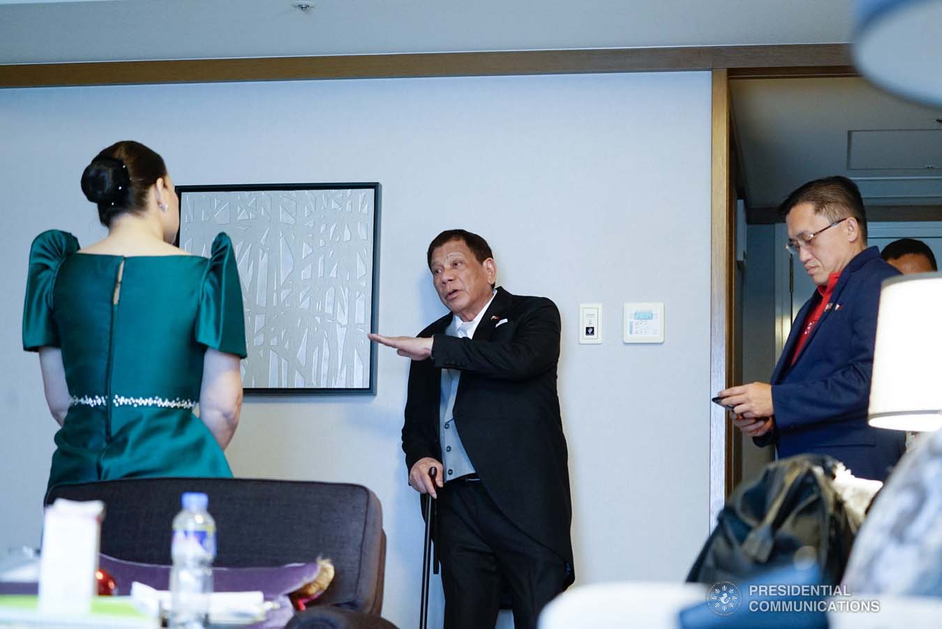 President Rodrigo Roa Duterte chats with his daughter, Davao City Mayor Sara Duterte-Carpio, and Senator Christopher "Bong" Go as they prepare for the Ceremonies of the Accession to the Throne of His Majesty Emperor Naruhito while at a hotel in Tokyo, Japan on October 22, 2019. KING RODRIGUEZ/PRESIDENTIAL PHOTO