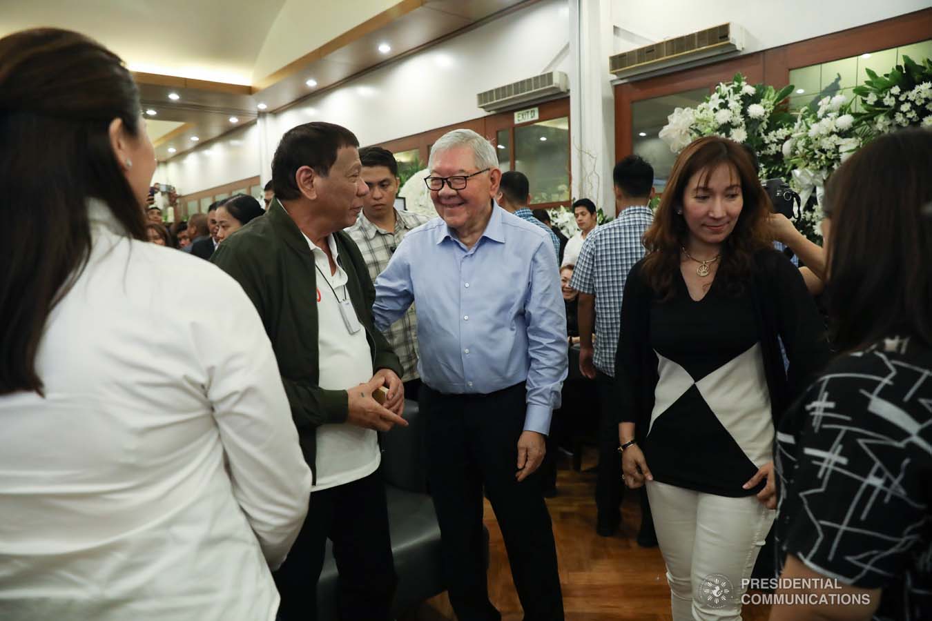 President Rodrigo Roa Duterte chats with former House Speaker Feliciano Belmonte Jr. while visiting the wake of the late former Senate President Aquilino Pimentel Jr. at the Heritage Memorial Park in Taguig City on October 22, 2019. ROBINSON NIÑAL JR./PRESIDENTIAL PHOTO